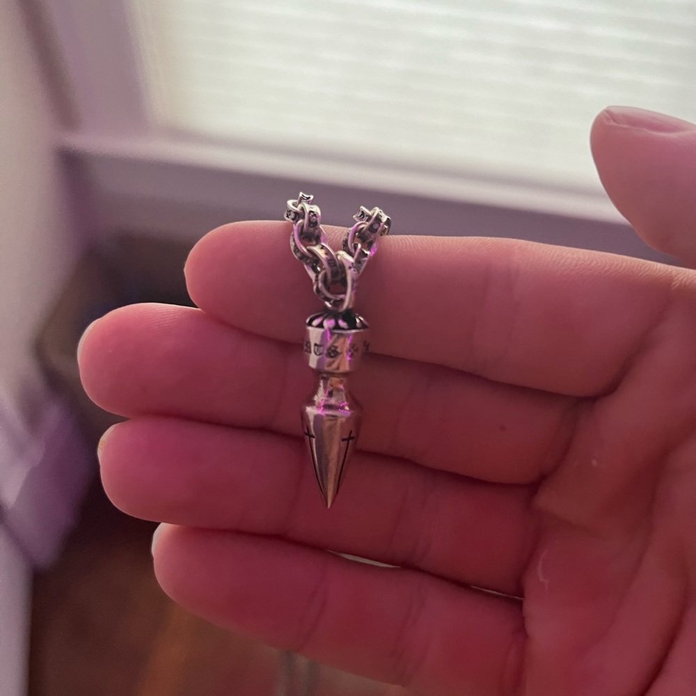 Silver Chrome Hearts necklace.
